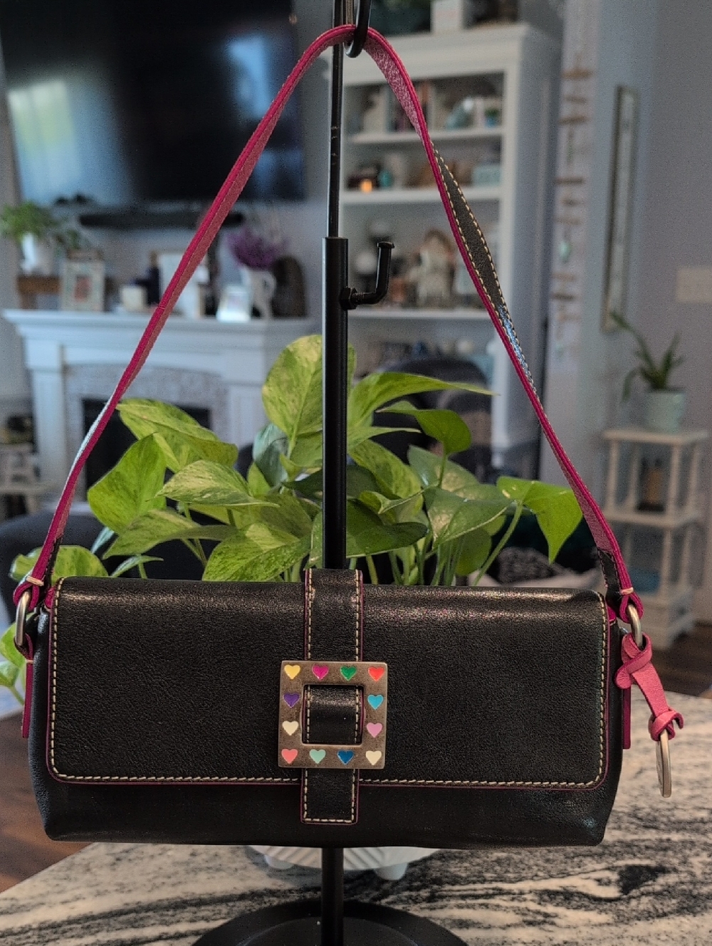 Dooney & Bourke Black Leather Shoulder Bag with Pink Strap and Hearts Buckle